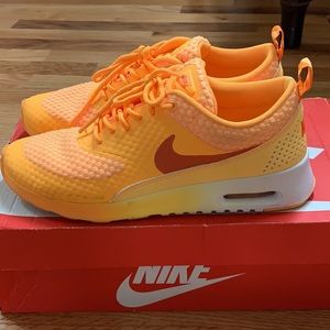 Orange nike sneakers